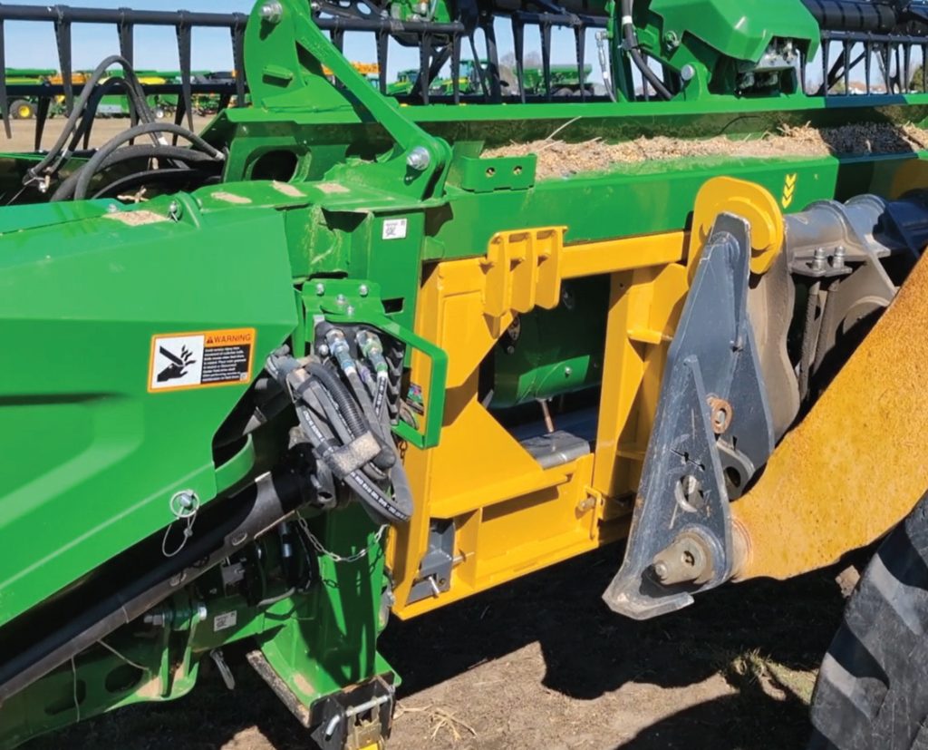 Bish Implement Mover transporting a heavy item with a tractor