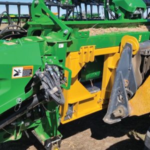 Bish Implement Mover transporting a heavy item with a tractor