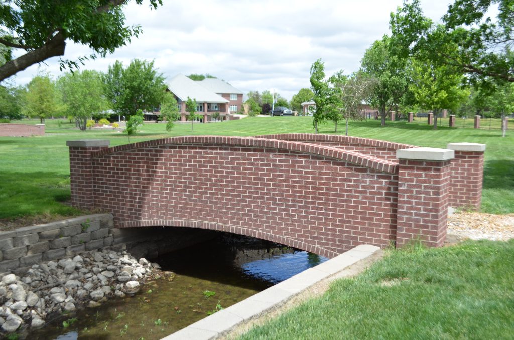 Custom brick bridge installation by Bish Enterprises in Nebraska