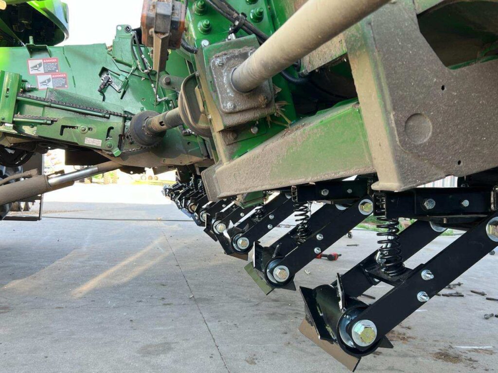 Close-up image showing Corn Stalk Roller protecting tractor tires