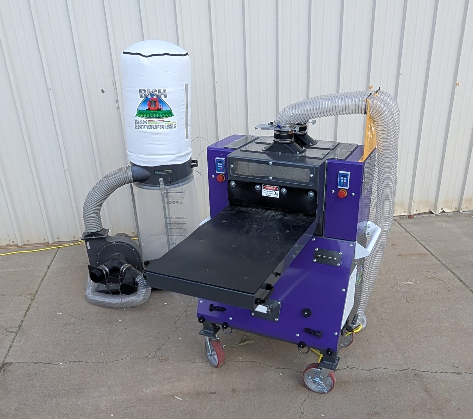 Front view of Bish Decorticator showing infeed and cutter system