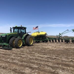 Universal flag pole mount for agricultural equipment