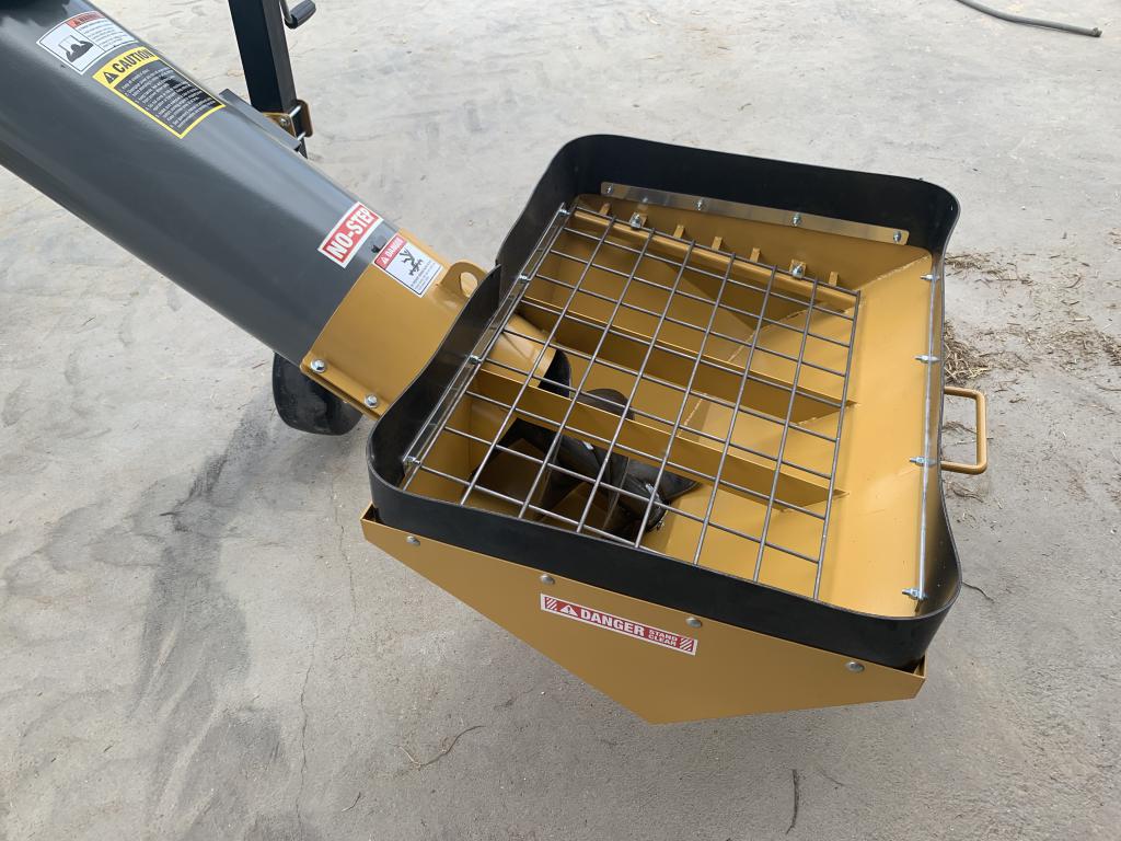 Detail of jump auger highlighting grain flow path and mounting points