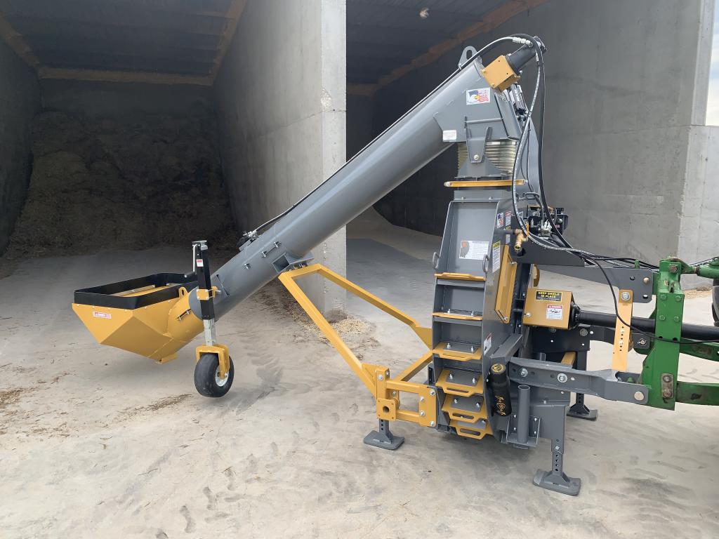 Side view of corn cracker jump auger showing auger flighting and discharge design