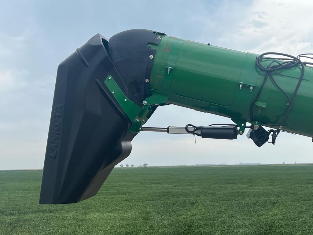 Detail of 13.5-inch tippy spout highlighting hinge and discharge opening